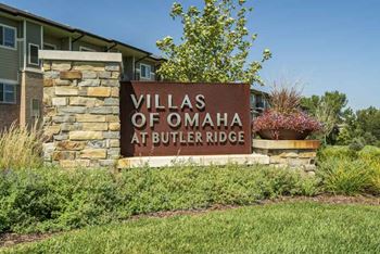 Entrance sign to villas of omaha