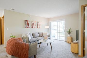 Lincoln apartment for rent - a living room with a couch and a coffee table