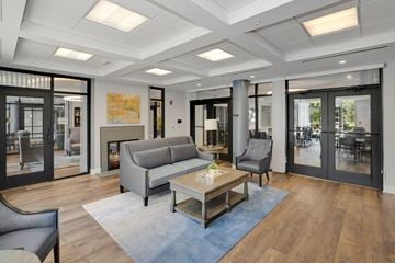 Frederick apartment for rent - a living room with couches and a coffee table