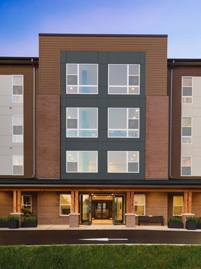 Clinton apartment for rent - a rendering of a brick building with large windows