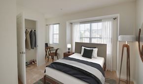 Frederick townhouse for rent - a bedroom with a bed and a closet