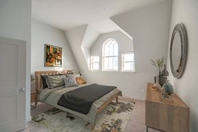 Baltimore apartment for rent - a bedroom with a bed and a window
