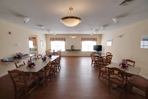Prince Frederick apartment for rent - a dining room with tables and chairs in a multipurpose room