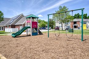 Great Mills apartment for rent - the preserve at ballantyne commons playground with play equipment and houses