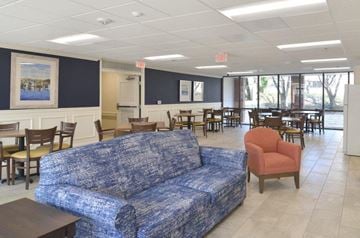 Annapolis apartment for rent - a living room with a couch and tables and chairs