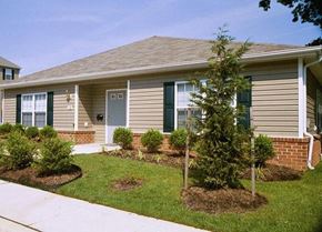 Annapolis apartment for rent - exterior of community room with a tree in the front yard