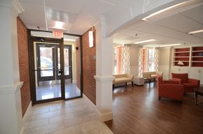 Annapolis apartment for rent - a view of the entrance to the leasing office with couches and chairs