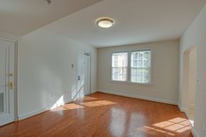 Washington apartment for rent - spacious living room with hardwood floors