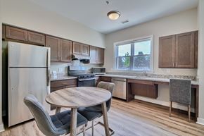 Frederick apartment for rent - A kitchen with a table and chairs.