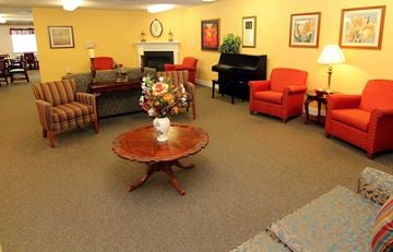 Glen Burnie apartment for rent - a living room filled with furniture and a fire place
