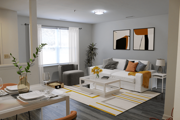 Salisbury apartment for rent - a living room with a white couch and a coffee table
