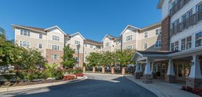 Upper Marlboro apartment for rent - A large building with a driveway in front of it.