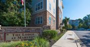 Upper Marlboro apartment for rent - The Lodge at Marlton sign in front of a building.