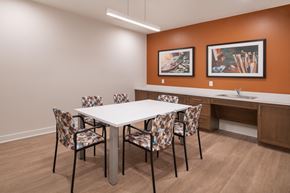 Dundalk apartment for rent - a dining area with a table and chairs and a sink