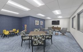 Baltimore apartment for rent - A conference room with a long table surrounded by chairs.