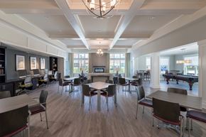 Prince Frederick apartment for rent - A large room with tables and chairs and a pool table.