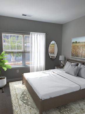 Edgewood apartment for rent - a bedroom with a bed and two windows
