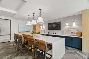 Houston apartment for rent - Modern community lounge showcasing communal seating, upscale interior finishes, and thoughtfully designed resident gathering spaces.