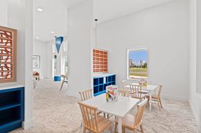 San Marcos apartment for rent - Children’s activity room featuring dedicated play tables, built-in storage, and space for creative learning.