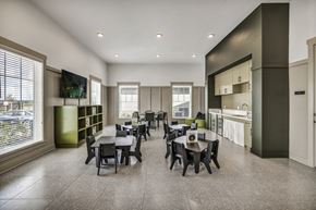 Von Ormy apartment for rent - Activity Room with a table and chairs and a kitchen in the background