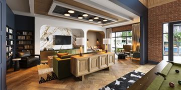 Austin apartment for rent - A modern living room with a pool table and a television.
