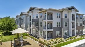 San Antonio apartment for rent - apartment buildings with a playground in front of them