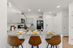 San Marcos apartment for rent - Open kitchen featuring a large island, bright cabinetry, and everyday functionality.