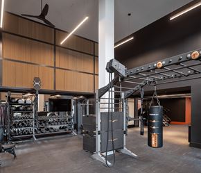Woodbridge apartment for rent - A gym with a variety of equipment including a punching bag.
