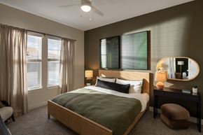 Venice apartment for rent - A bedroom with a large bed and a ceiling fan.