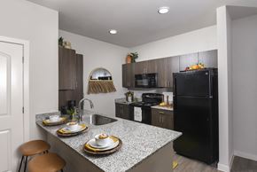 San Antonio apartment for rent - Modern kitchen featuring ample cabinet storage, contemporary appliances, and a functional layout designed for everyday living.