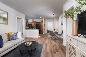 Cleveland apartment for rent - Open-concept apartment featuring a modern kitchen, dining area, and comfortable living room with stylish finishes throughout.