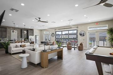 Perrysburg apartment for rent - a living room with couches and a pool table