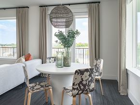 Austin apartment for rent - a dining room with a table and chairs and a window