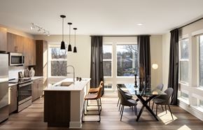 Mclean apartment for rent - A modern kitchen with a dining table and chairs.