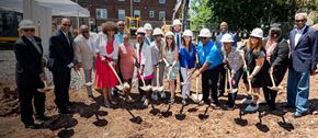 Norwalk apartment for rent - a group of people holding shovels in a dirt field