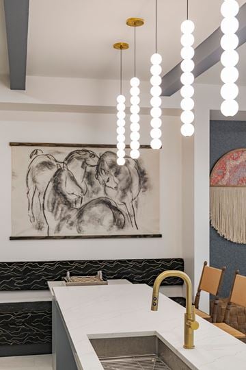 Fort Worth apartment for rent - A kitchen with a sink and a painting on the wall.