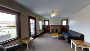 Ann Arbor apartment for rent - A living room with a fireplace and a couch.