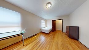 Ann Arbor apartment for rent - A room with a wooden floor and a white ceiling.