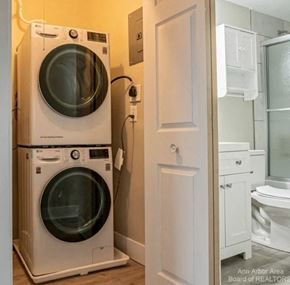 Ann Arbor apartment for rent - A white washer and dryer in a small laundry room.