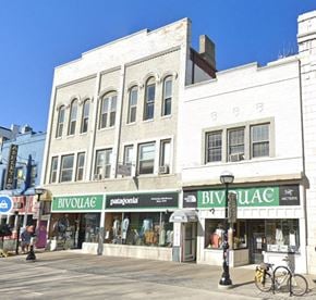 Ann Arbor apartment for rent - A white building with a green awning that says Bivouac.