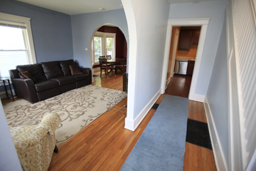 Ann Arbor apartment for rent - A living room with a couch and a chair.