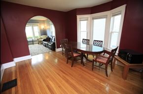 Ann Arbor apartment for rent - A dining room with a wooden table and chairs.