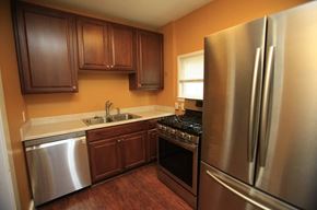Ann Arbor apartment for rent - A kitchen with a stainless steel refrigerator and oven.