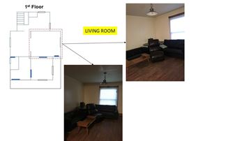 Ann Arbor apartment for rent - A living room with a couch and a coffee table.