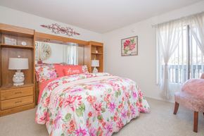 Buena Park apartment for rent - a bedroom with a bed and a dresser