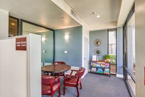 Corona apartment for rent - a room with a table and chairs