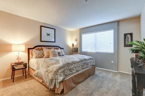 Palm Springs apartment for rent - a bedroom with a bed and a window