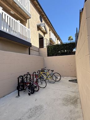 Alhambra apartment for rent - A row of bicycles are parked on a concrete patio.