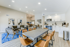 Glendora apartment for rent - a dining room table with chairs and a kitchen in the background