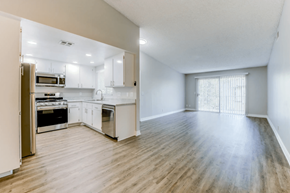 Glendora apartment for rent - a kitchen and living room with hardwood floors and white walls